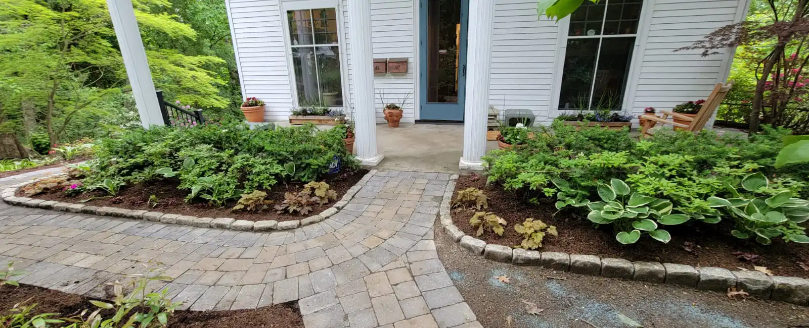 Front door entrance with curved patio